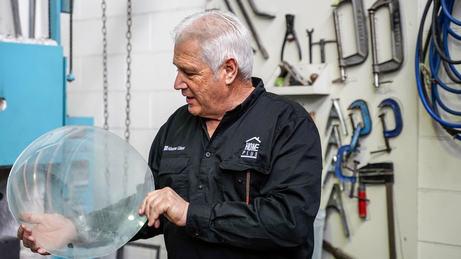 image of man holding glass object talking business south